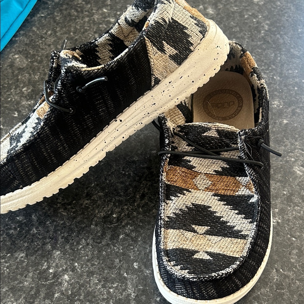 Women’s Hey Dude size 6 black, tan, gray Aztec print